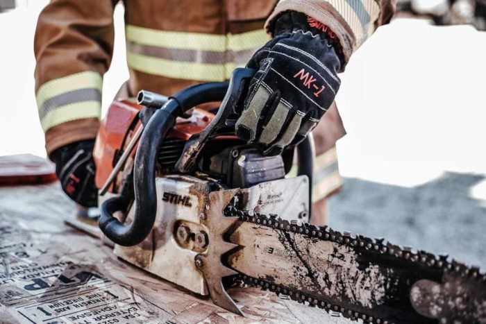 Vanguard MK-1 Structural Hybrid Firefighting Glove (Gauntlet Cuff) - Action Photo on Firefighter - Dinges Fire Company
